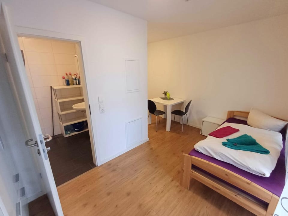 Bed, Living room, Photo of the whole room, Seating area, Bedroom, towels, wardrobe