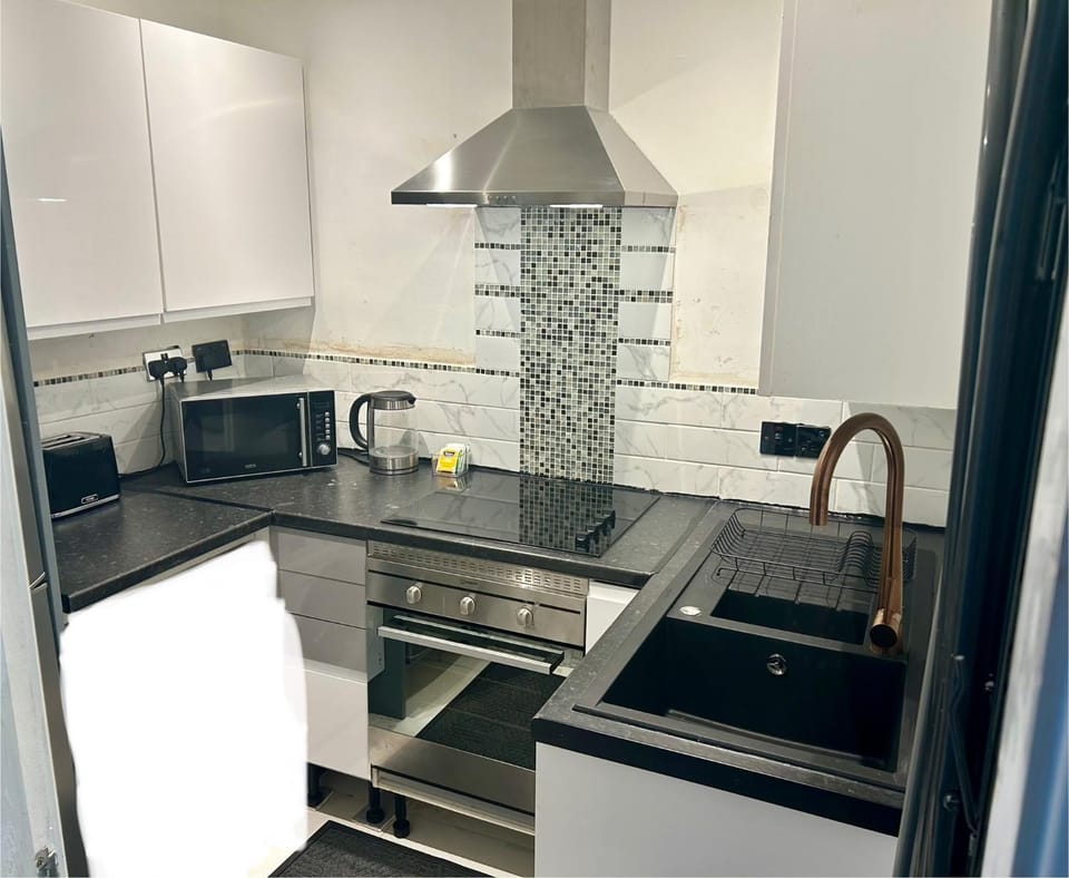 Kitchen or kitchenette, stove