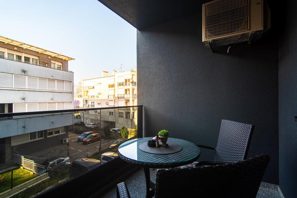 Property building, View (from property/room), Balcony/Terrace, Balcony/Terrace, Seating area, Location, air conditioner