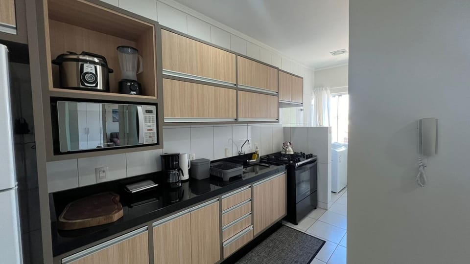 Kitchen or kitchenette, minibar, stove