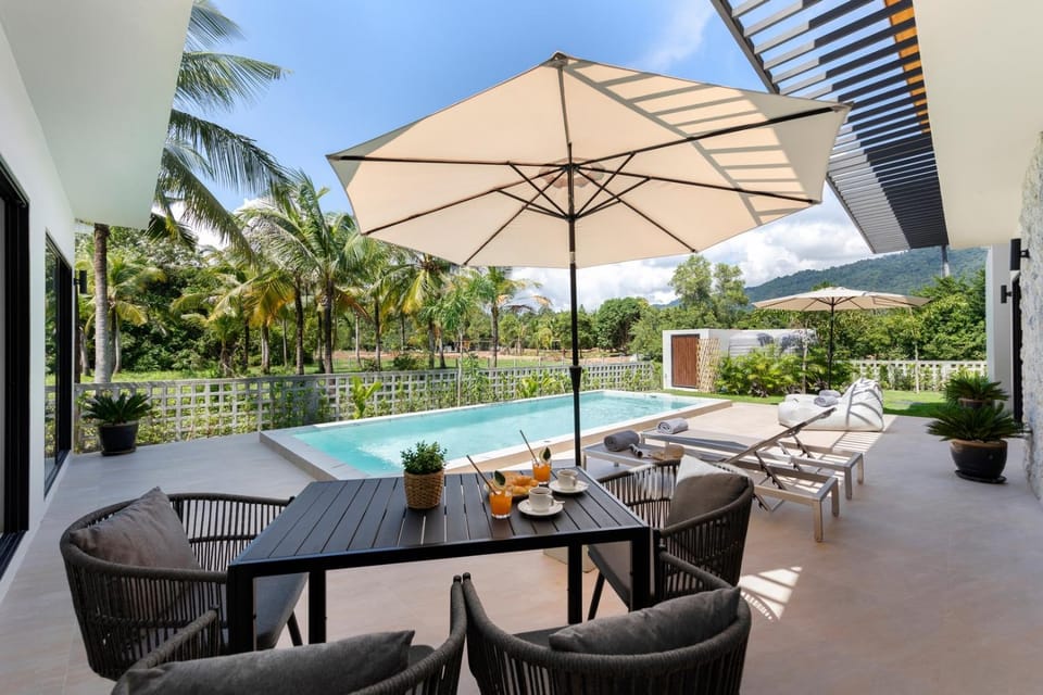 Property building, Patio, Day, View (from property/room), Balcony/Terrace, Seating area, Garden view, Pool view, Swimming pool, sunbed