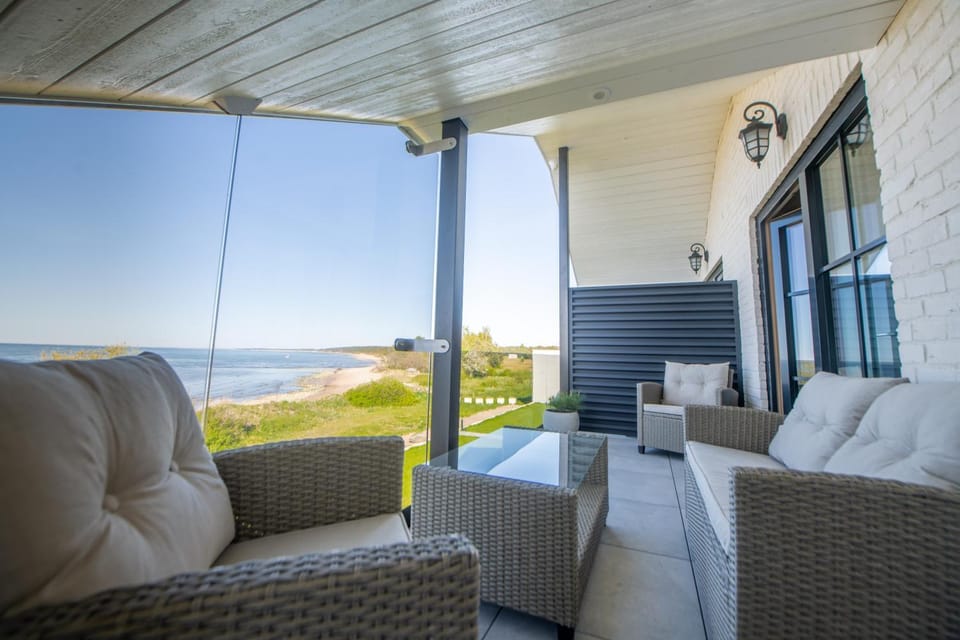 View (from property/room), Balcony/Terrace, Seating area, Sea view