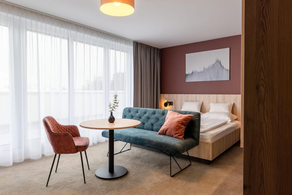 Bed, Seating area, Bedroom