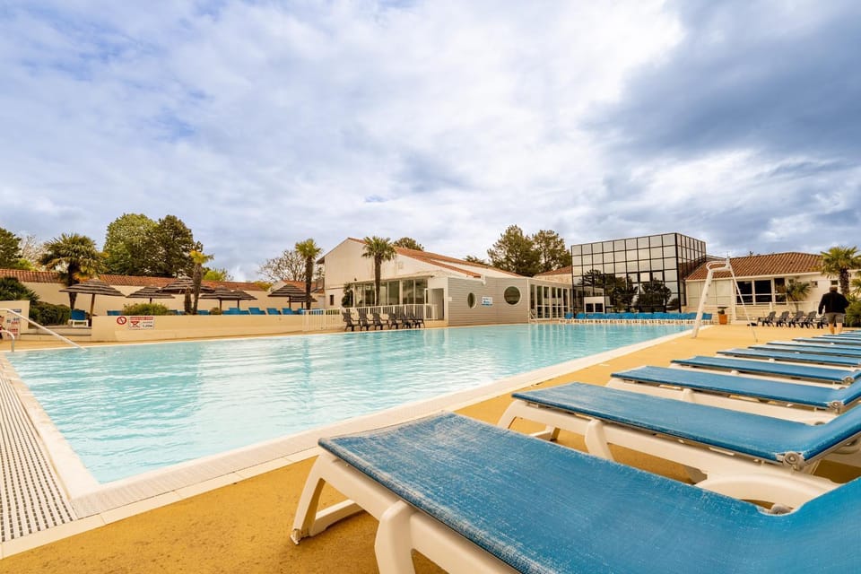 Property building, Living room, Swimming pool