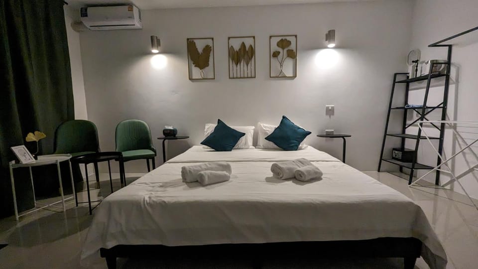 Bed, Photo of the whole room, Bedroom, towels, air conditioner