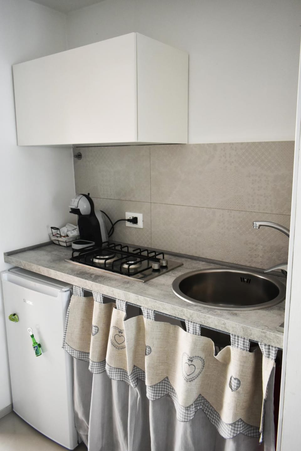 Kitchen or kitchenette, stove