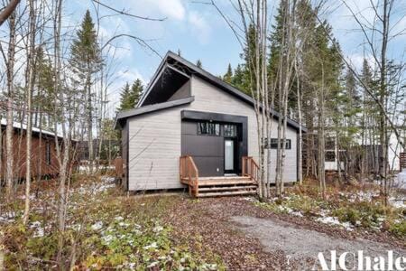 Archibald - Cozy avec spa, sauna, piscine Chalet in Quebec