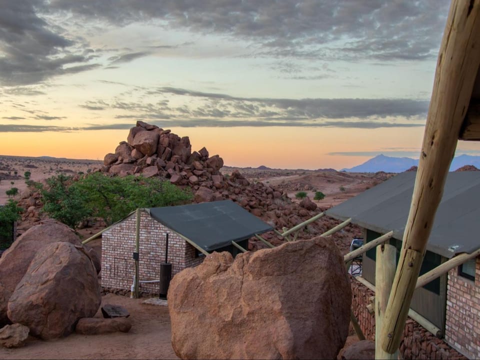 Property building, Nearby landmark, Natural landscape, Mountain view, Sunrise