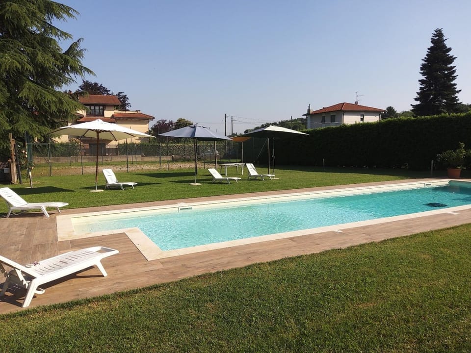 Property building, Living room, Swimming pool