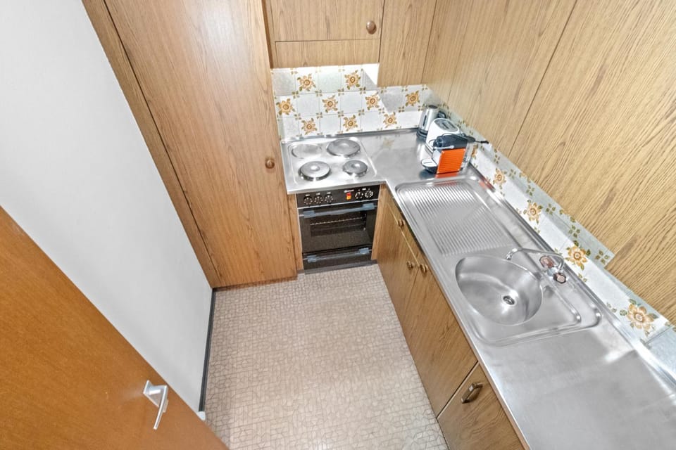 Kitchen or kitchenette, stove, kitchen