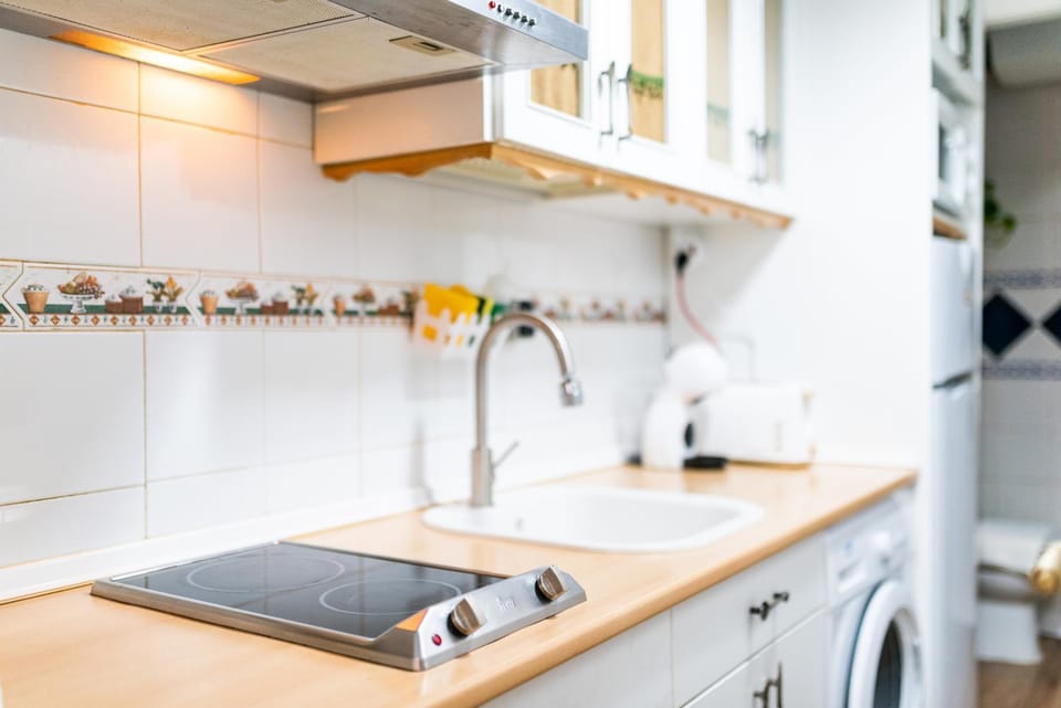Kitchen or kitchenette, stove
