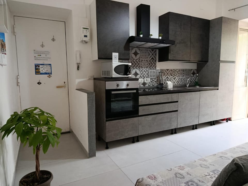 Facade/entrance, kitchen