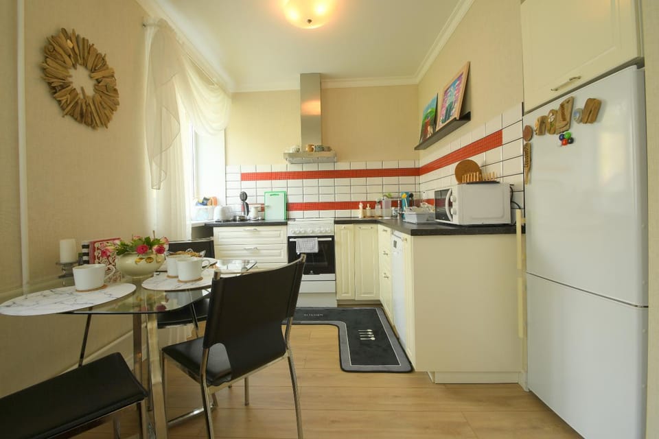 Kitchen or kitchenette, Dining area, furniture, microwave, oven, kitchen