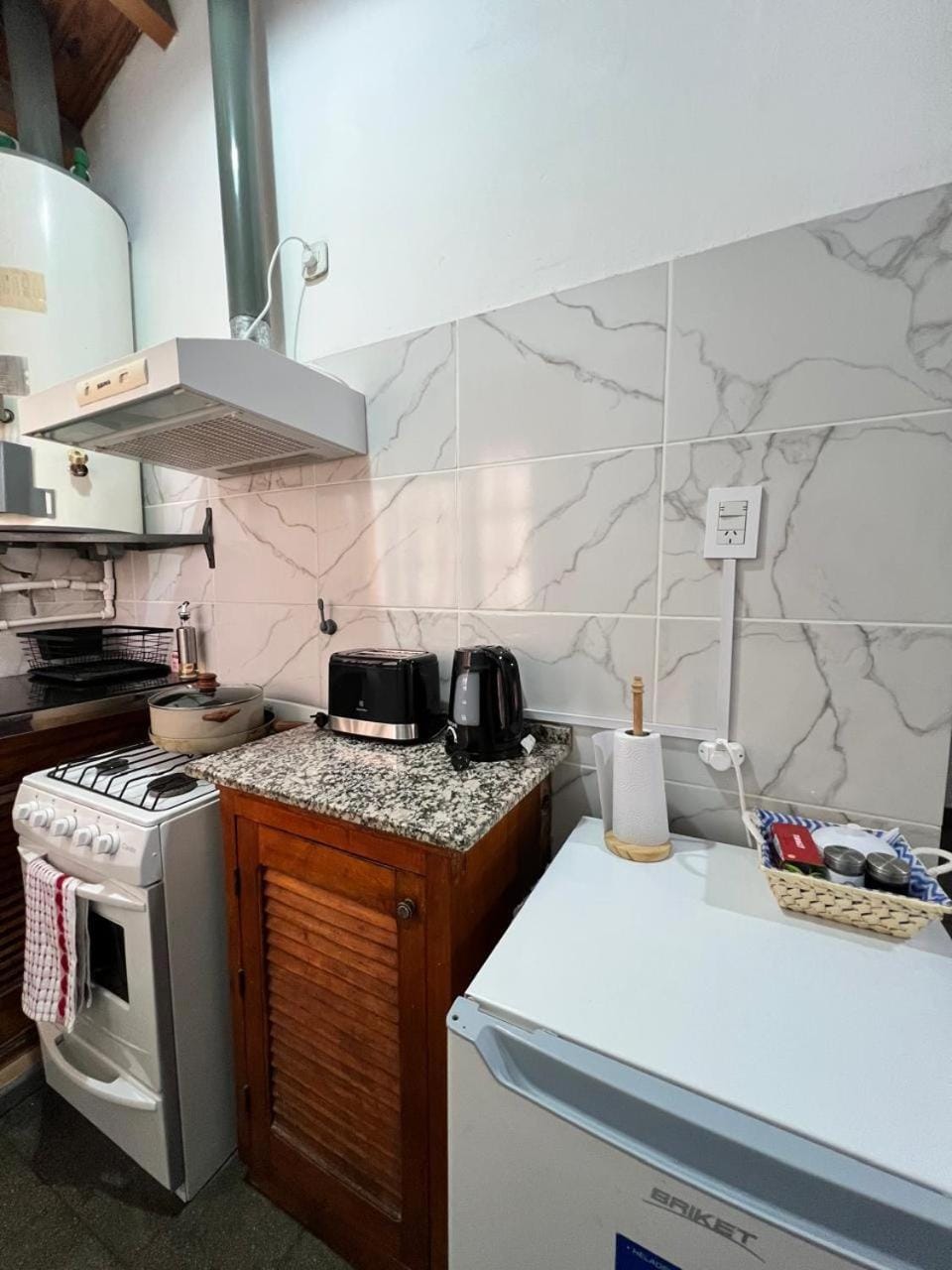 Kitchen or kitchenette, oven, toaster