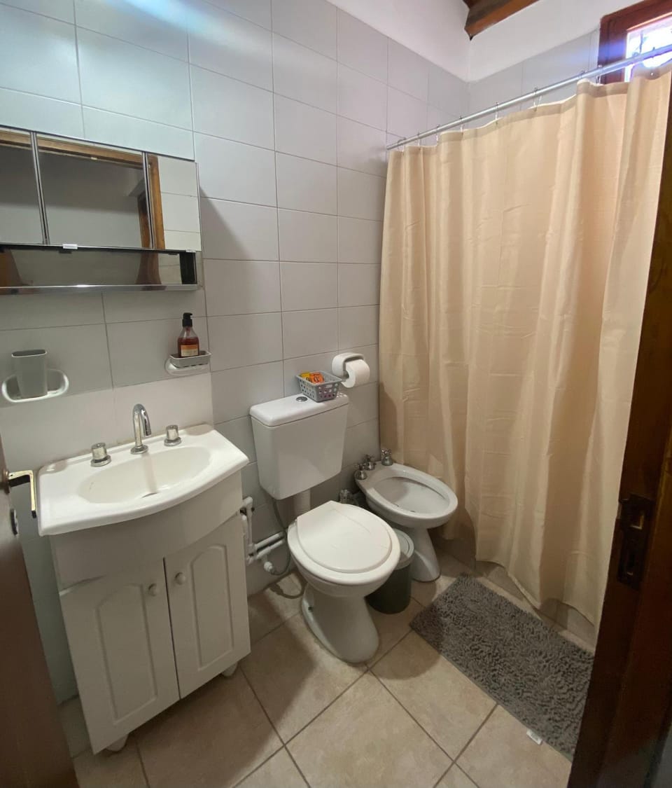 Bathroom, bidet, hair dryier, towels