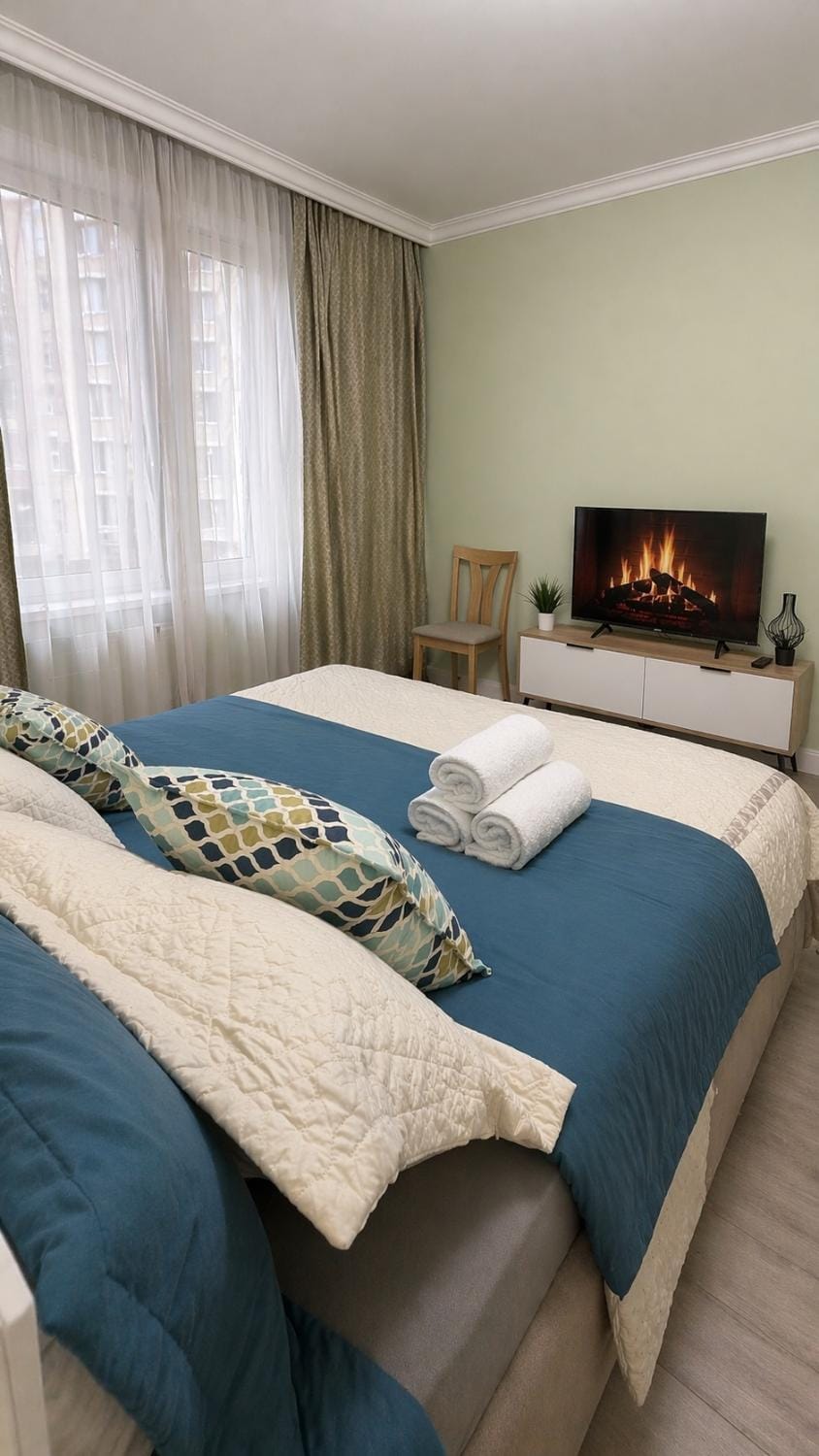 Комфортные апартаменты бизнес-класса с атмосферой уюта и тишины Apartment in Almaty