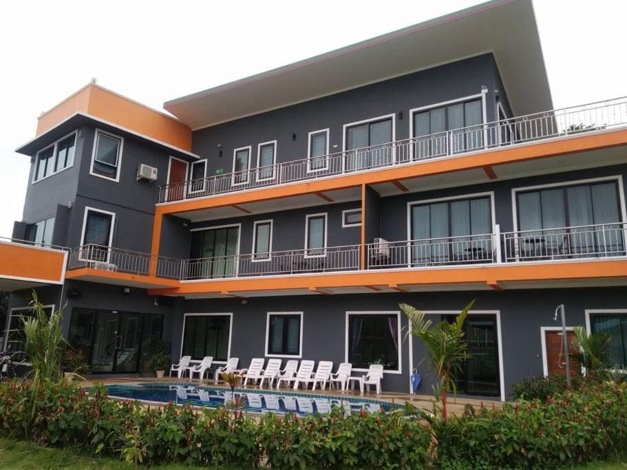 Property building, Day, View (from property/room), Pool view, Swimming pool, sunbed