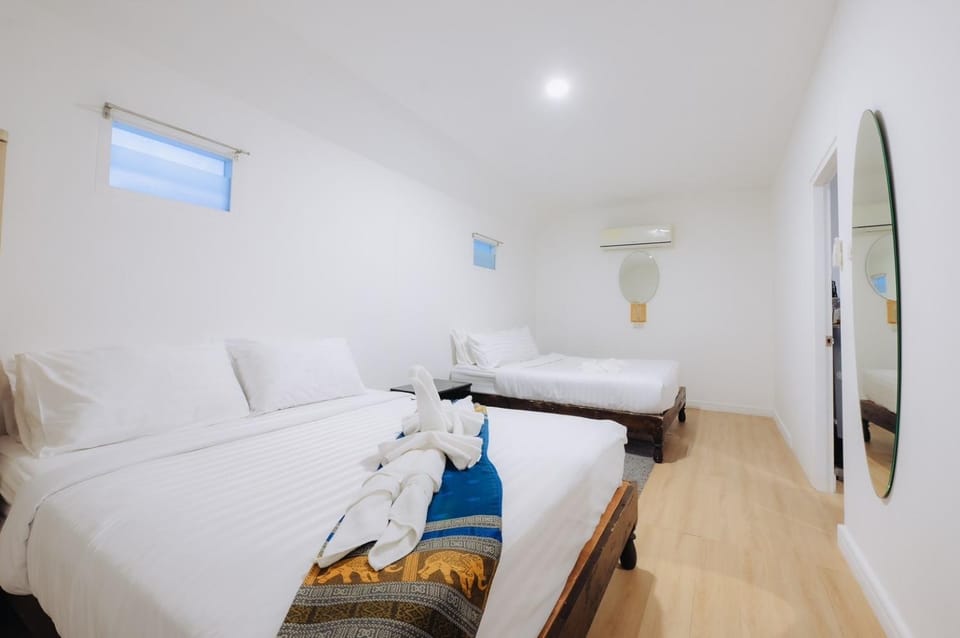 Bed, Photo of the whole room, Bedroom, towels, air conditioner
