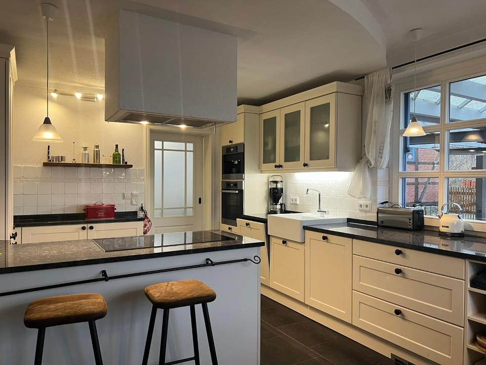Kitchen or kitchenette, stove, kitchen