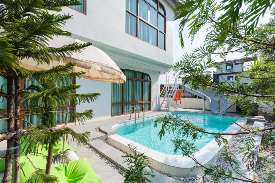 Property building, Patio, Day, Pool view, Swimming pool