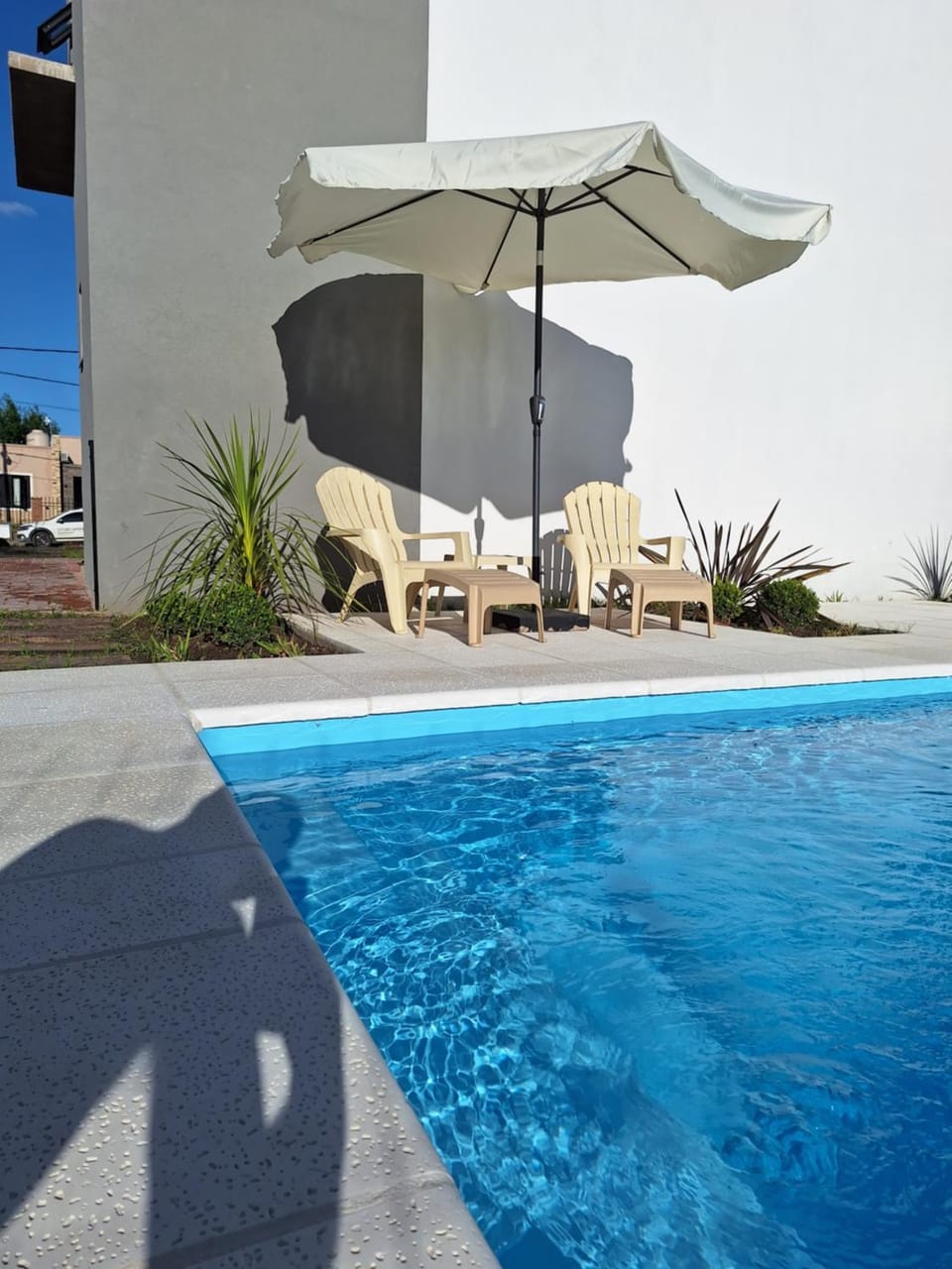 Swimming pool, sunbed