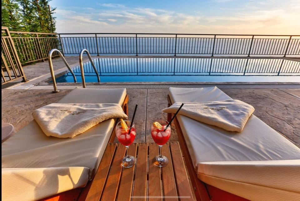 Patio, View (from property/room), Pool view, Sea view, Swimming pool, sunbed