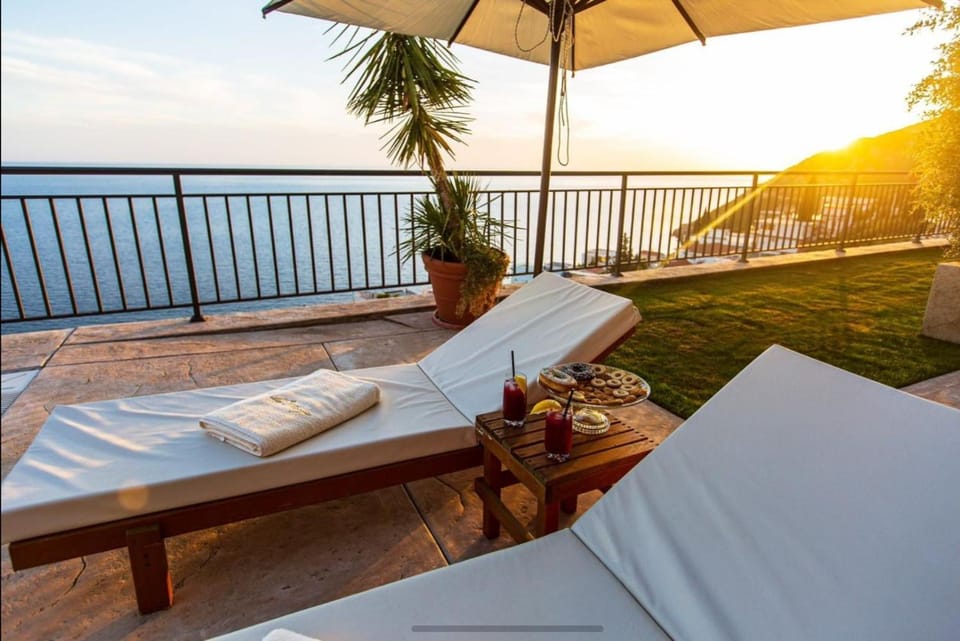 Sea view, Swimming pool, Sunset, sunbed, towels