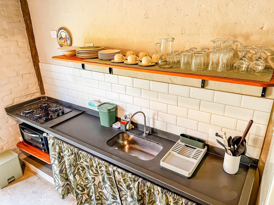 Kitchen or kitchenette, stove, kitchen