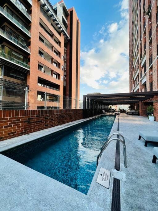Property building, Balcony/Terrace, Pool view, Swimming pool, Swimming pool