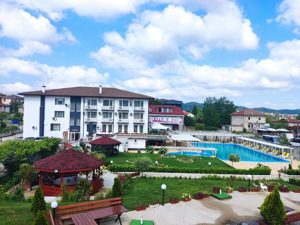 Property building, Natural landscape, Pool view, Swimming pool