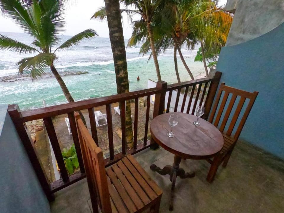 Balcony/Terrace, Seating area, Dining area, Beach, Sea view