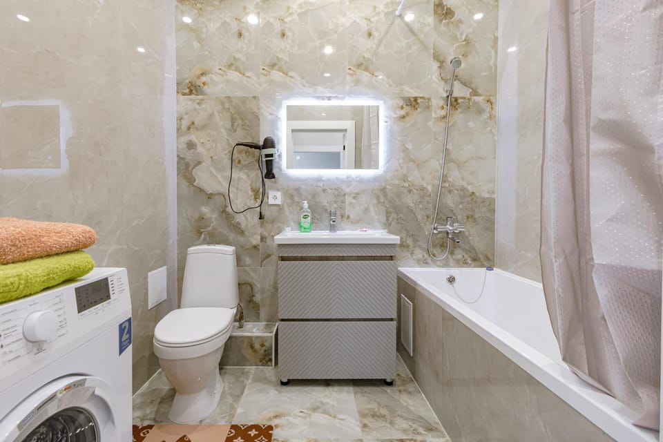 Shower, Toilet, Bath, towels, washing machine