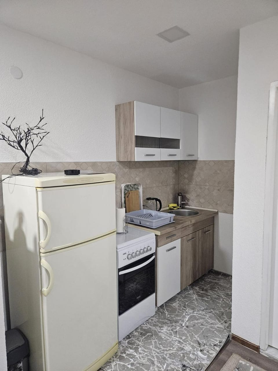 Kitchen or kitchenette, oven, stove