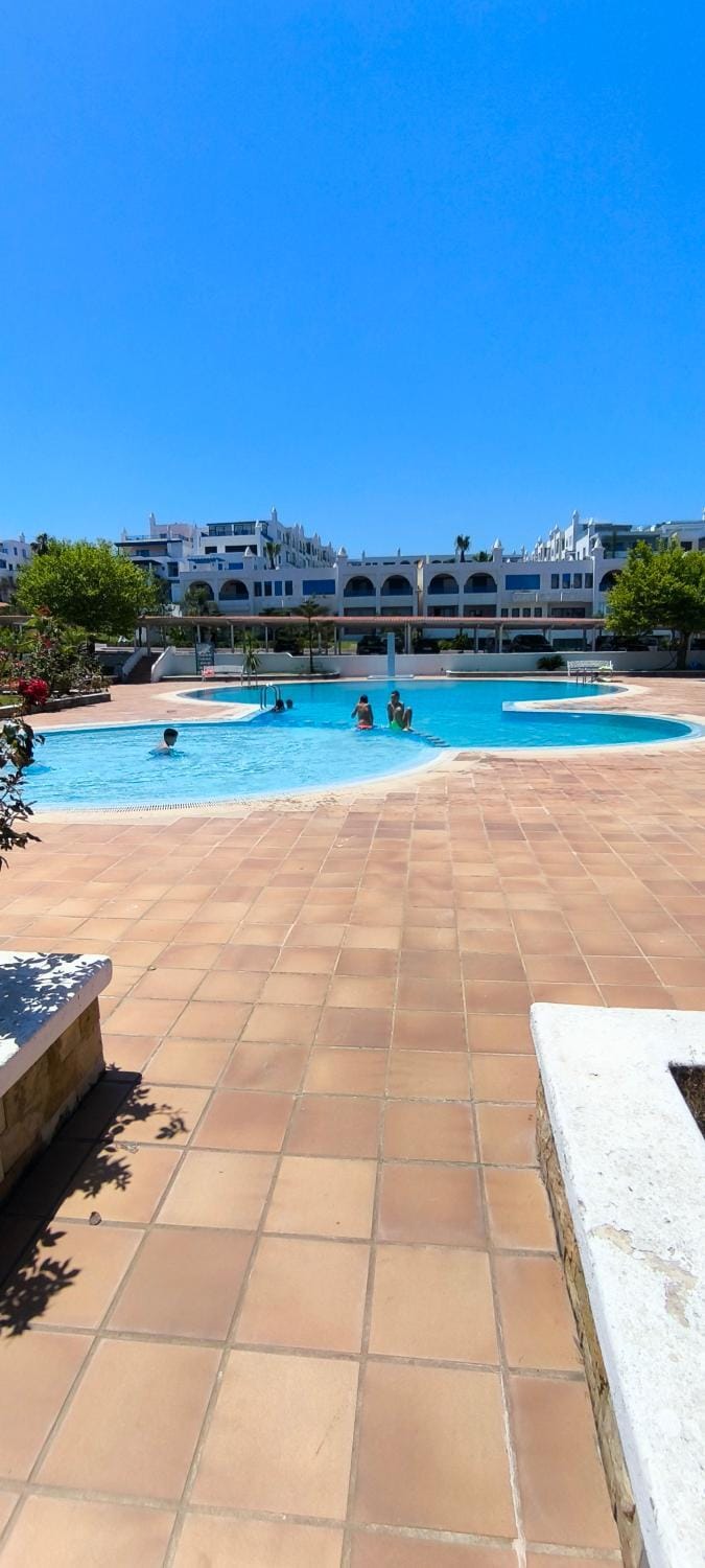 Swimming pool, sunbed