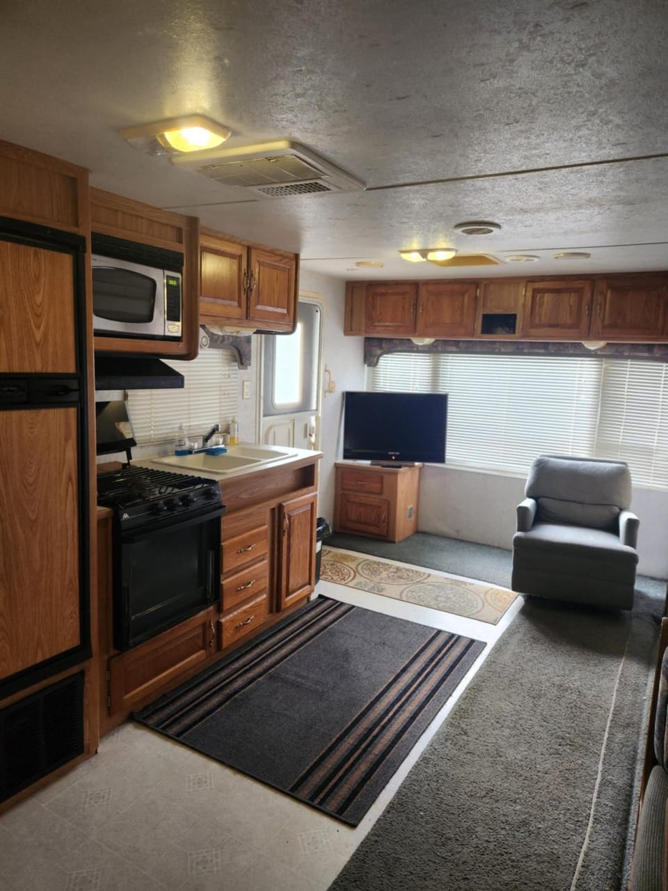 Kitchen or kitchenette, oven, stove