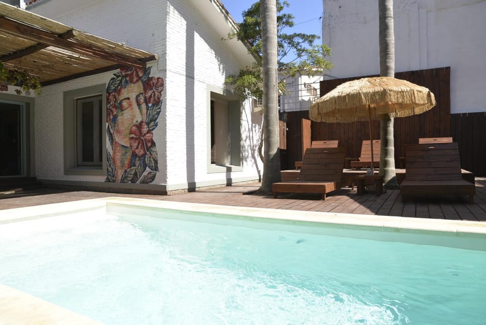 Property building, Patio, Day, Garden, Solarium, Lounge or bar, Pool view, Swimming pool, Inner courtyard view, oven, sunbed