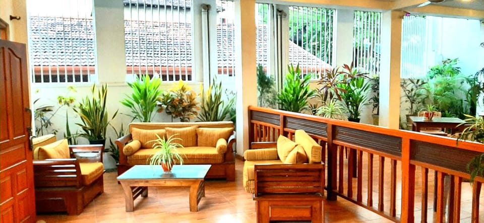 Day, View (from property/room), Lobby or reception, Seating area, Garden view