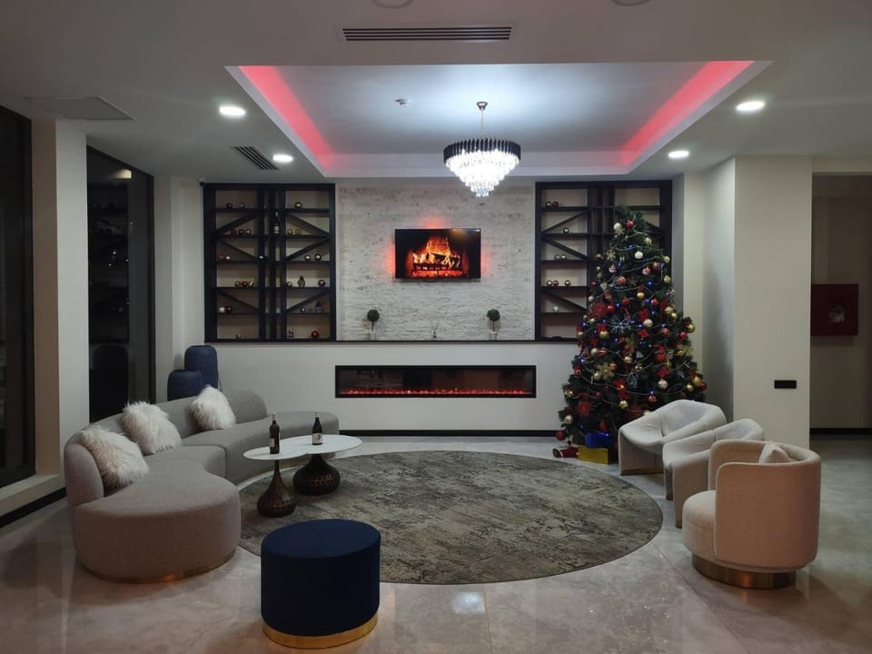 Living room, Lobby or reception, Seating area, flat iron