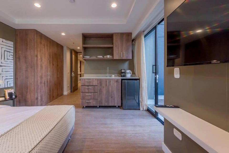 Bed, TV and multimedia, Kitchen or kitchenette, wardrobe, kitchen