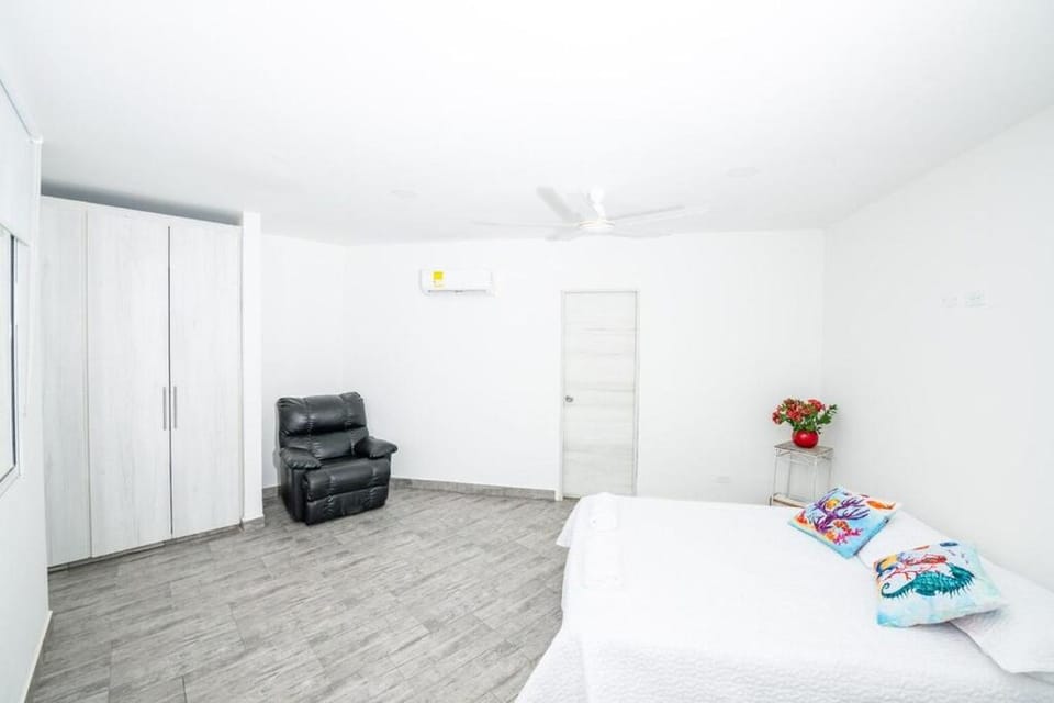 Bed, Bathroom, Photo of the whole room, Bedroom, fireplace, towels, wardrobe, air conditioner