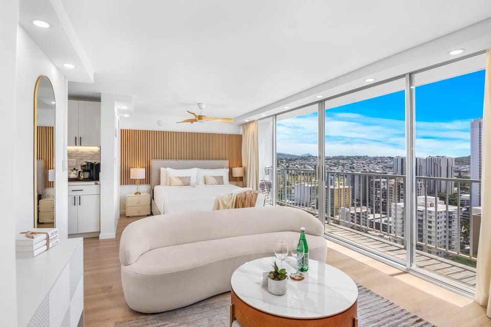 View (from property/room), Living room, Seating area, Dining area, City view