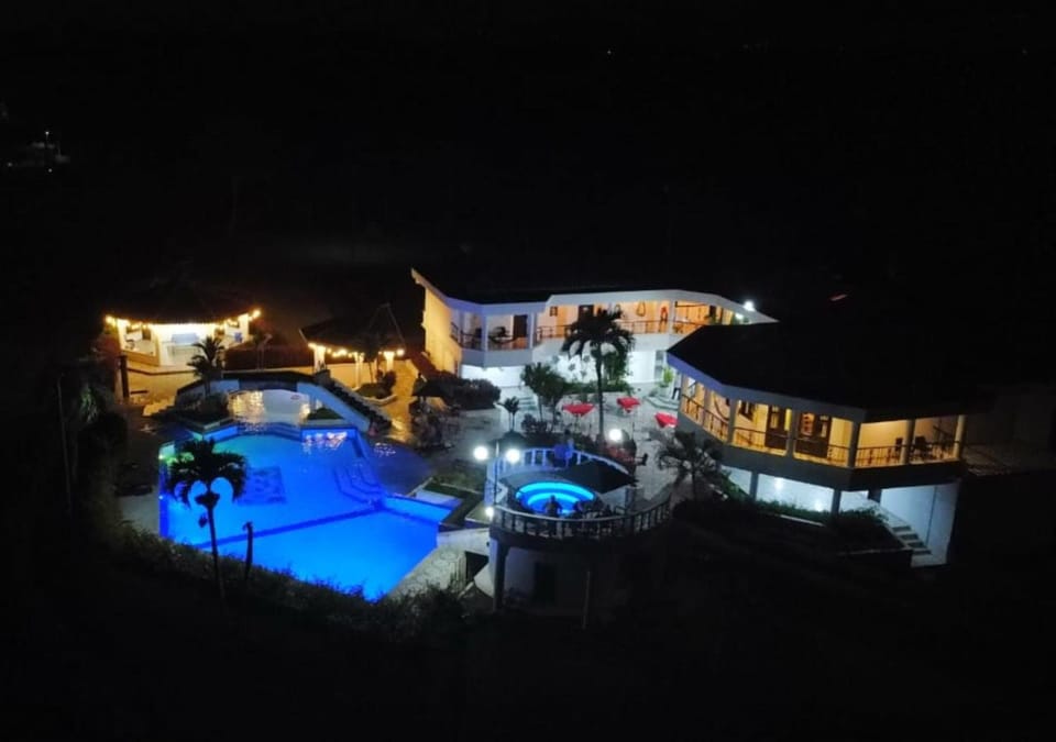 Property building, Night, Pool view, Swimming pool