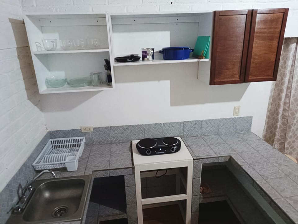 Kitchen or kitchenette, stove