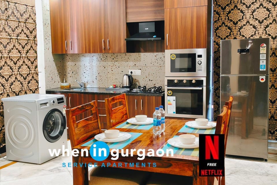 Kitchen or kitchenette, Dining area, microwave, minibar, stove, washing machine, kitchen, air conditioner