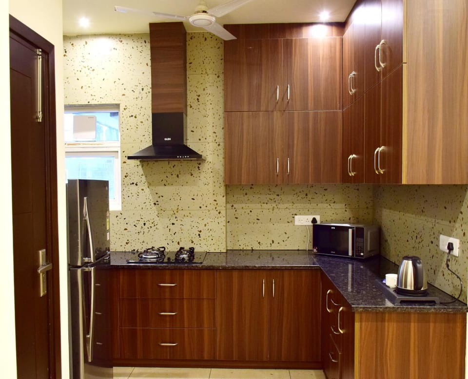 Kitchen or kitchenette, microwave, stove, kitchen