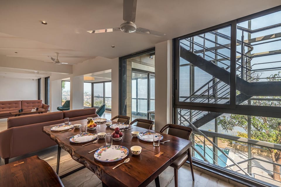 View (from property/room), Living room, Food and drinks, Seating area, Dining area, Food, Pool view, Swimming pool