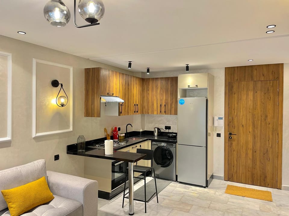 Kitchen or kitchenette, Living room, Seating area, Dining area
