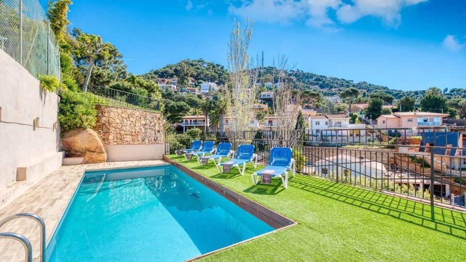 Property building, Living room, Swimming pool