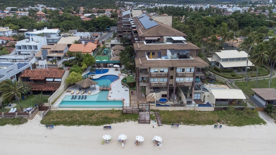 Property building, Day, Neighbourhood, Natural landscape, Bird's eye view, Beach, Pool view, Sea view, Swimming pool, Location, sunbed