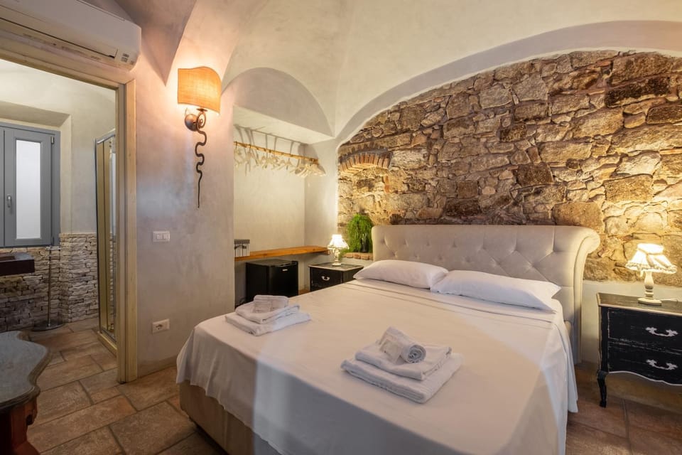 Bed, Photo of the whole room, Bedroom, towels, air conditioner